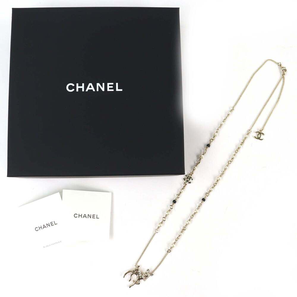 CHANEL Gold Pearl Logo Necklace - Picture 2 of 8